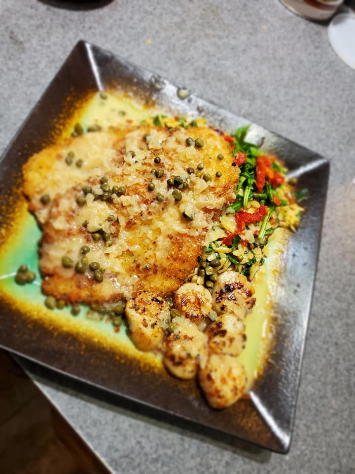 Parmesan-crusted flounder served with spinach and radicchio orzo.